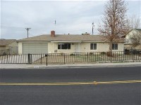Fenced 4 bedroom home in Victorville